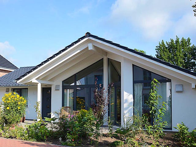 Eengezinswoning Natalie 2 (KfW-Effizienzhaus 40 EE) van Dammann-Haus met zadeldak — prefab woning van 135 m²